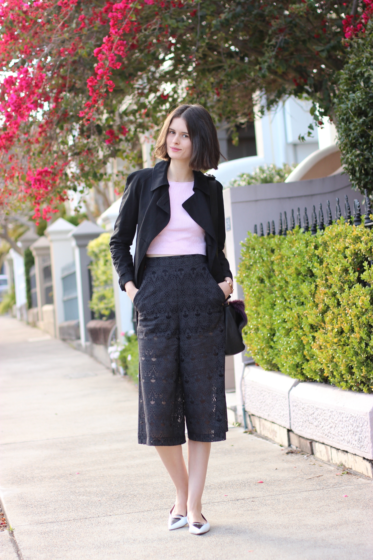BYCHILL SYDNEY FASHION BLOG Chloe Hill wearing Lilya pink crop knit top, Shona Joy black culottes, Tabitha Simmons Shoes, Deadly Ponies Bag and Acne cropped black trench coat