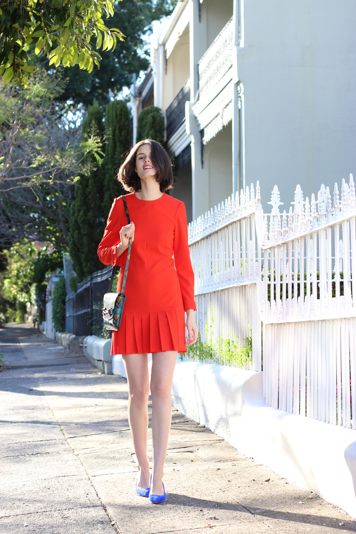 BY CHILL CHLOE HILL BLOGS Wearing Antipodium London century shift dress in flame red, with gucci blue and yellow shoulder bag and Nicholas Kirkwood electric blue heels