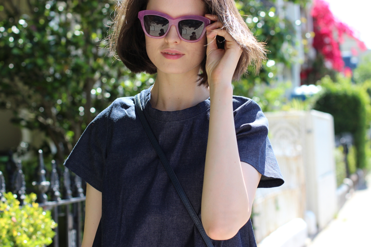 BY CHILL BLOG Chloe Hill wearing AM eyewear pink sunnies and Soot denim top