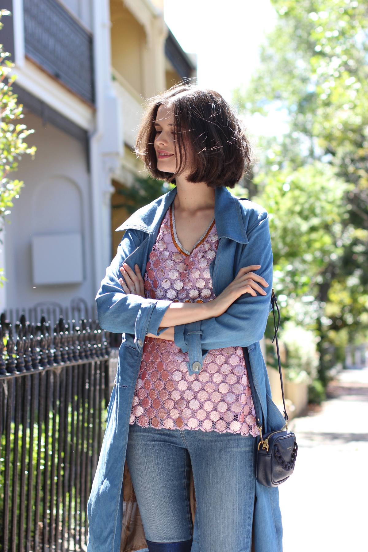 BY CHILL Chloe Hill Wearing Easton Pearson Pink metallic top, Dress up chambray trench coat and paige denim jeans