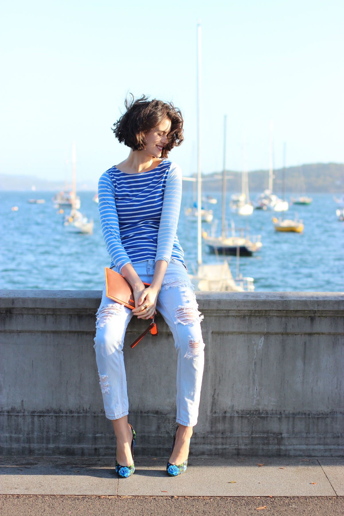 BY CHILL Chloe Hill in Boden Clothing blue breton striped top, one teaspoon denim jeans and miu miu floral heels at Rose Bay Sydney